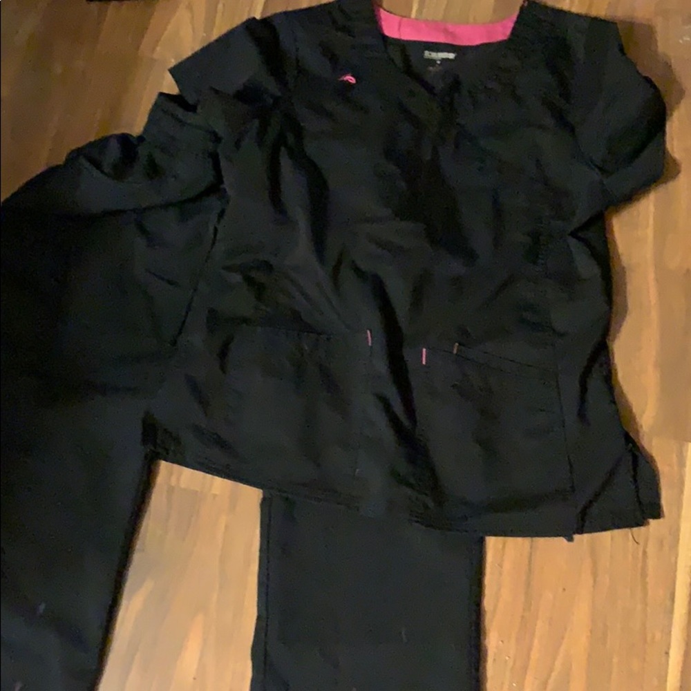 Two sets of scrubs